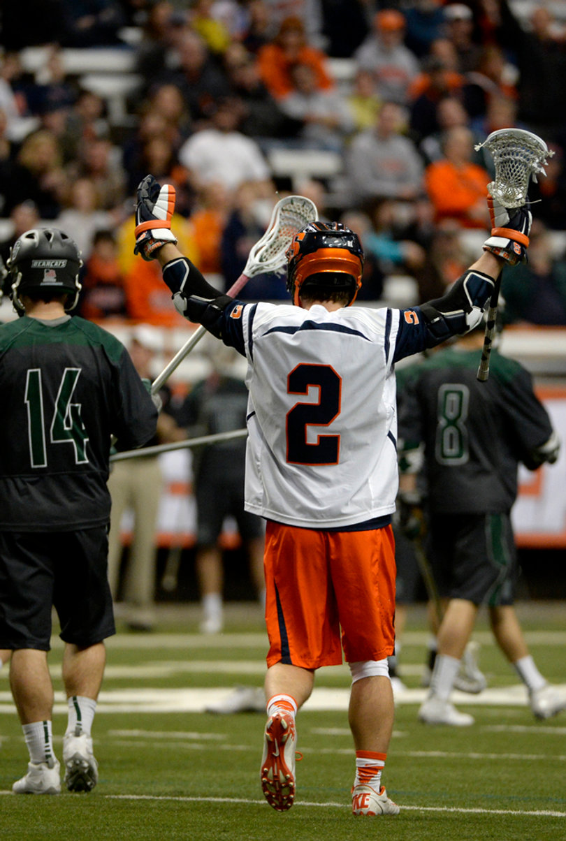 Rice raises his hands in celebration. Syracuse pulled out a 10-8 win for its second straight victory. 