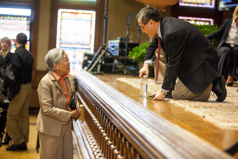 Shiu-Kai Chin, a professor of electrical engineering and computer science, speaks with Ruth Chen after the symposium.