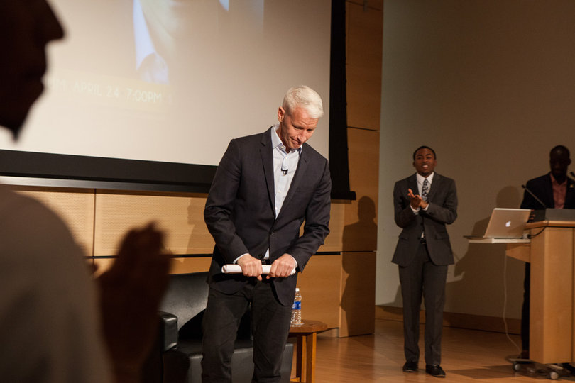 Students clap for Cooper as he finishes up his Q&A in the Joyce Hergenhan Auditorium Thursday night.