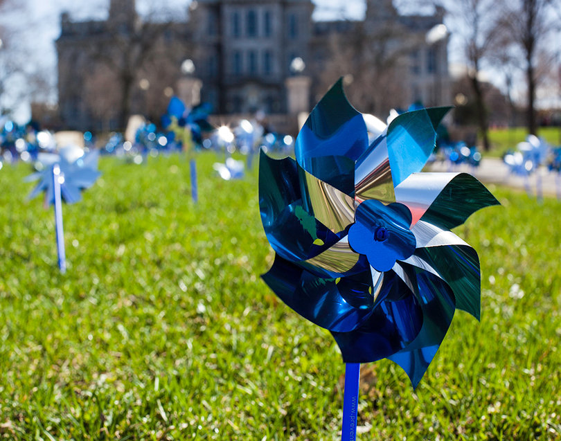 Groups raise awareness of child abuse by selling pinwheels, wristbands