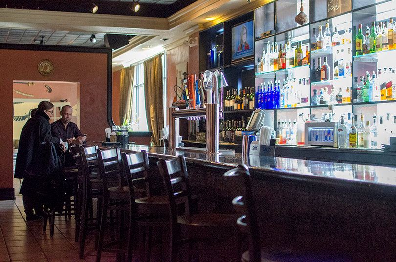 Paintings of Greek warriors lined the restaurant's walls. The Black Olive's new location near Armory Square is wide and spacious.