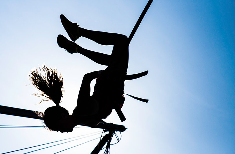 Emily Augello, 13, of Camilus, flies high in the air while strapped onto Quad Power Jump at The Great New York State Fair. Other activities for fair-goers include the Zombie Apocalypse and the Discover the Dinosaurs exhibits, along with the new Dragstrip Mega Slide. Wade Shows brought in 63 new rides when it replaced James E. Strates Shows as the new fair management company.