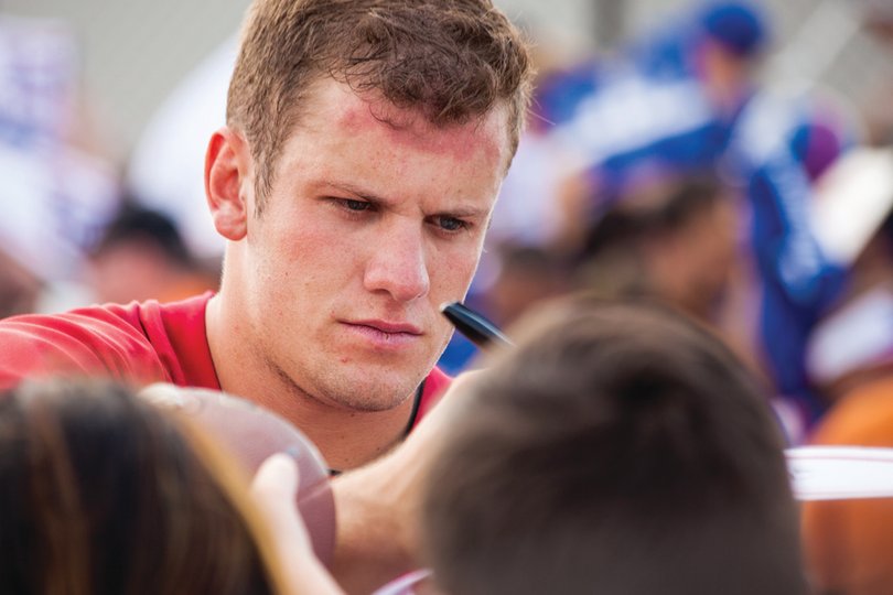 Nassib left Syracuse as one of the top quarterbacks in program history, statistically. Here he signs autographs after practice at Giants training camp on July 27.