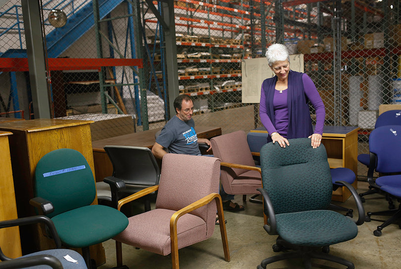 Rose Viviano, director of the downtown gallery Art Rage, shops for a new chair for her office space. Viviano has been a regular customer for many years.