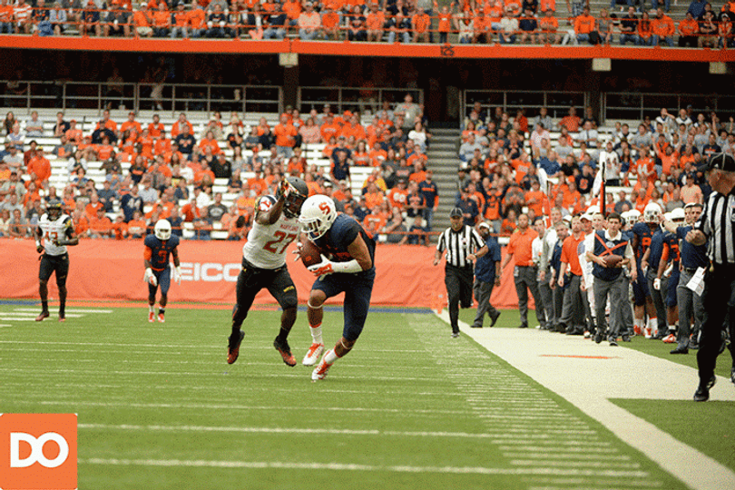 Senior wide receiver Jarrod West stumbles to the ground after hauling in a 51-yard reception. 