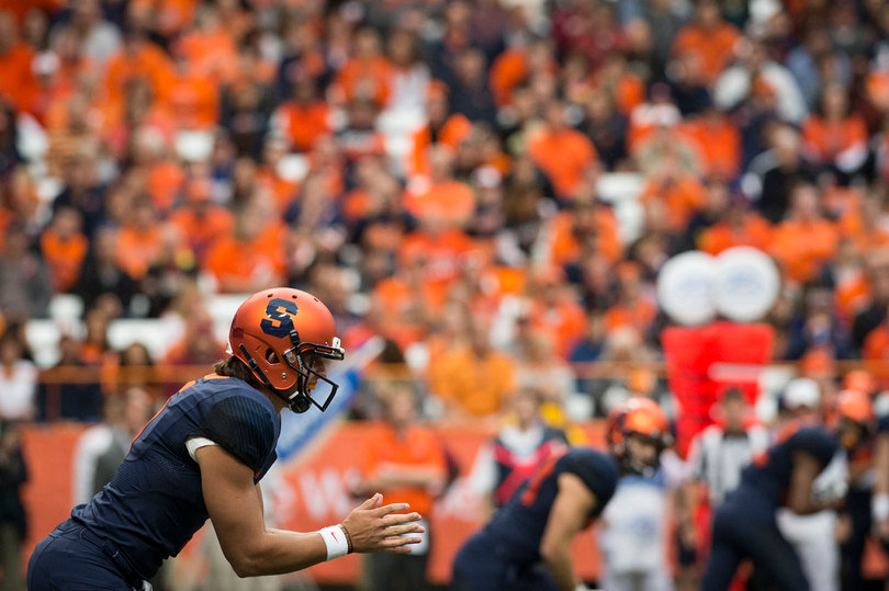 Wilson waits for a snap before leaving the game with an injury. After he left, AJ Long permanently took over the offense. 