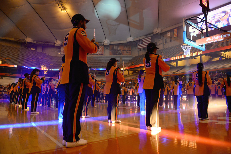 The Syracuse marching band serenades the Orange Madness crowd. 