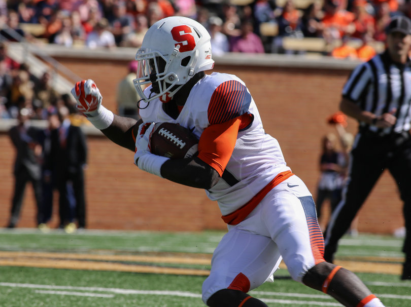 A Syracuse rusher cradles the ball in open space. The Orange had its best offensive day since Sept. 13.