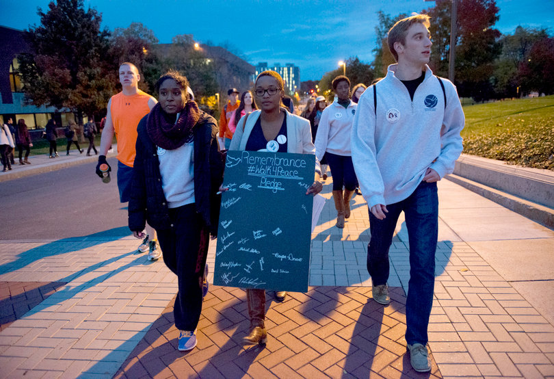 Remembrance Scholars and members of the SU community walked around campus in commemoration of Pan Am Flight 103 on Monday night as part of the Peace Walk event during Remembrance Week. 