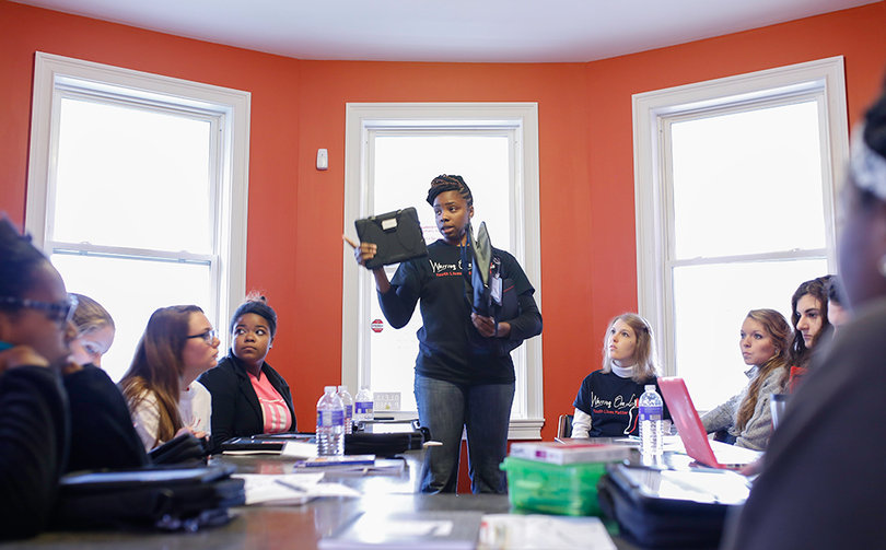 Tiffany Curtis, a graduate student at Syracuse University, handed out iPads so that every student can use the hashtag #truthaboutusis.