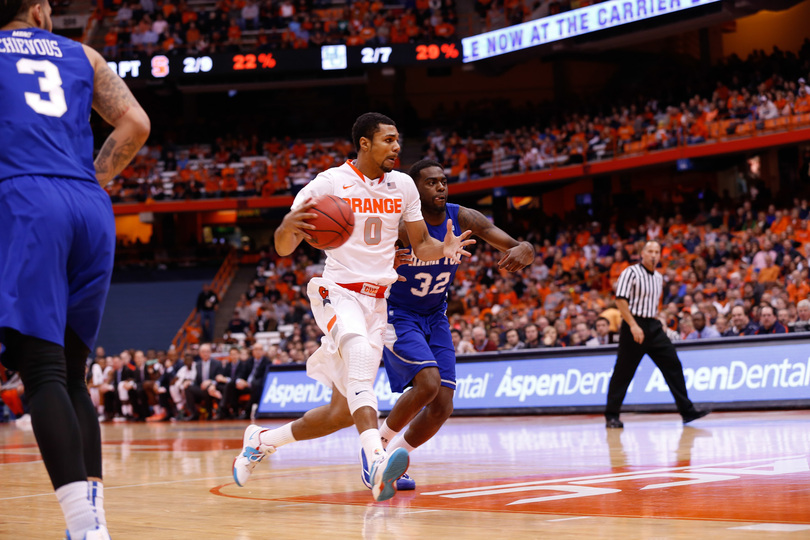 Gbinije struggles as point guard before excelling in 2nd half of Syracuse’s 65-47 win over Hampton