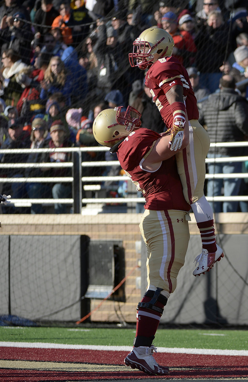 BC wide receiver Sherman Alston is lifted in the air after hauling in a 26-yard touchdown pass in the second quarter.