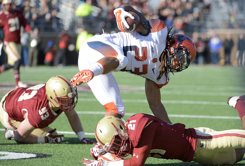 Senior Prince-Tyson Gulley gets brought down to the ground by his feet. He finished his senior season with just one touchdown. 