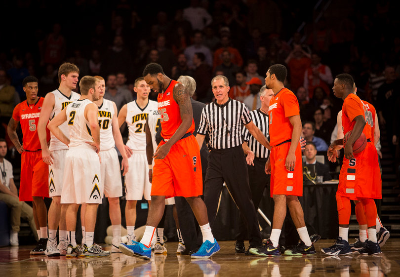 Christmas walks off the court with his head down during SU's 66-63 victory.