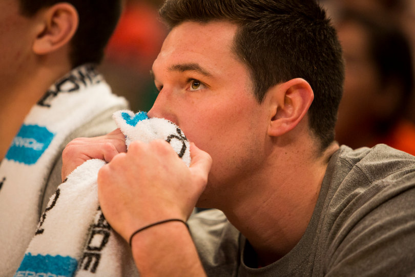 Walk-on Carter Sanderson watches intently during the second half of the Orange's three-point win.