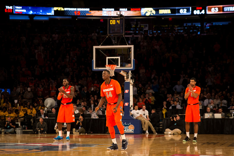 Christmas, Joseph and Gbinije react after McCullough made the first of two free throws with just more than eight seconds left.