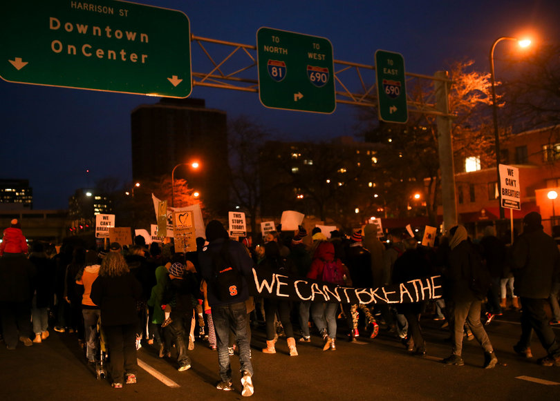 Students march downtown as  a part of the "March for Justice" event on Monday night.