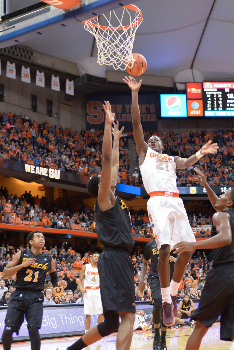 Roberson lofts a floater between two 49ers defenders. The sophomore had six points on 3-of-6 shooting.