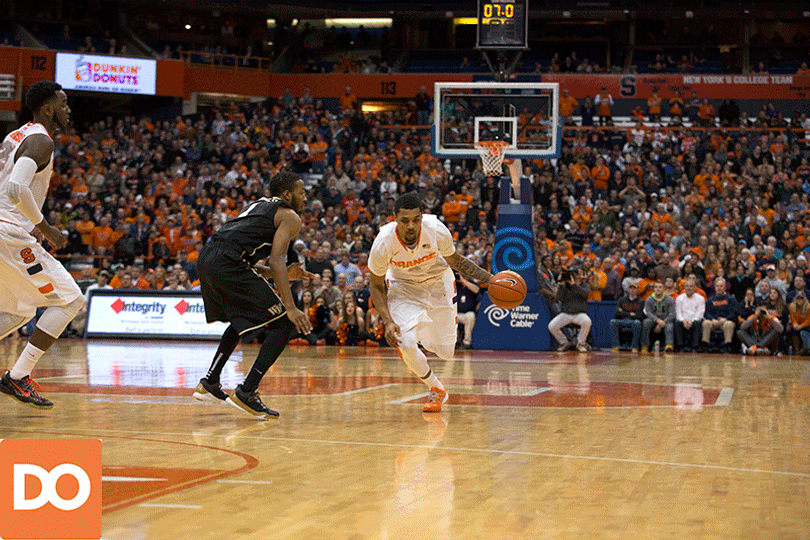 Gbinije attacks the left lane and gets off a layup attempt.