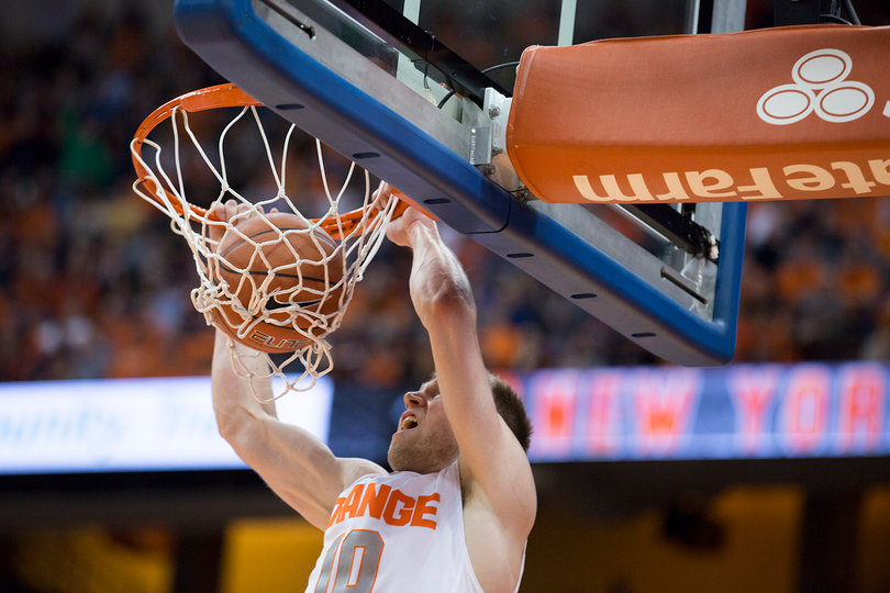 SU guard Trevor Cooney goes up for a dunk. His inside scoring was better than his shooting from the outside, where he connected on just two of his 12 3-point attempts. 