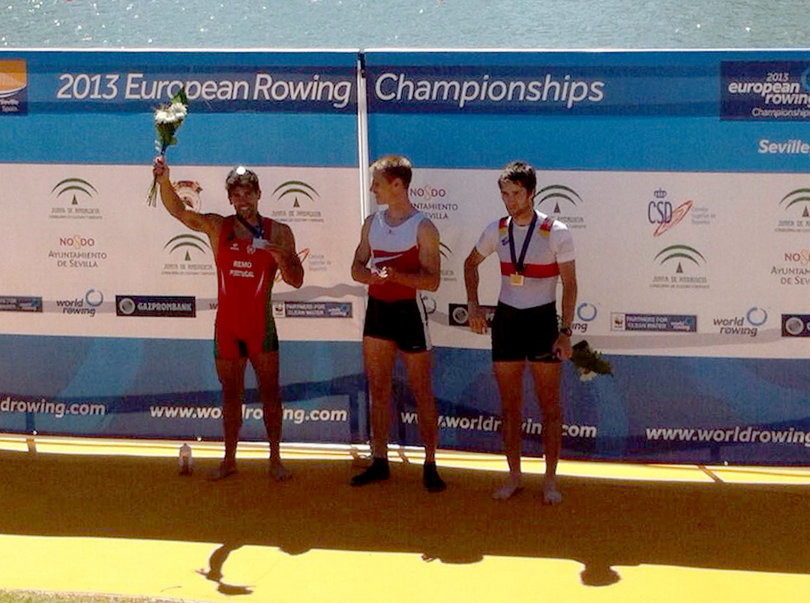 Pedro Fraga (left) of the Portugal rowing team celebrates after placing silver at the 2013 European Rowing Championships.