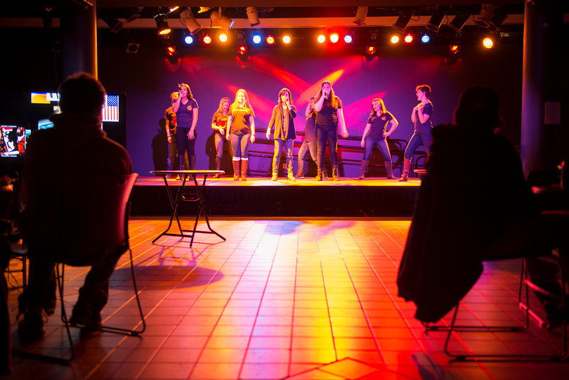 Main Squeeze, an on-campus a cappella group, performs for students attending the second annual Disabilifunk at Schine Underground Feb. 7.
