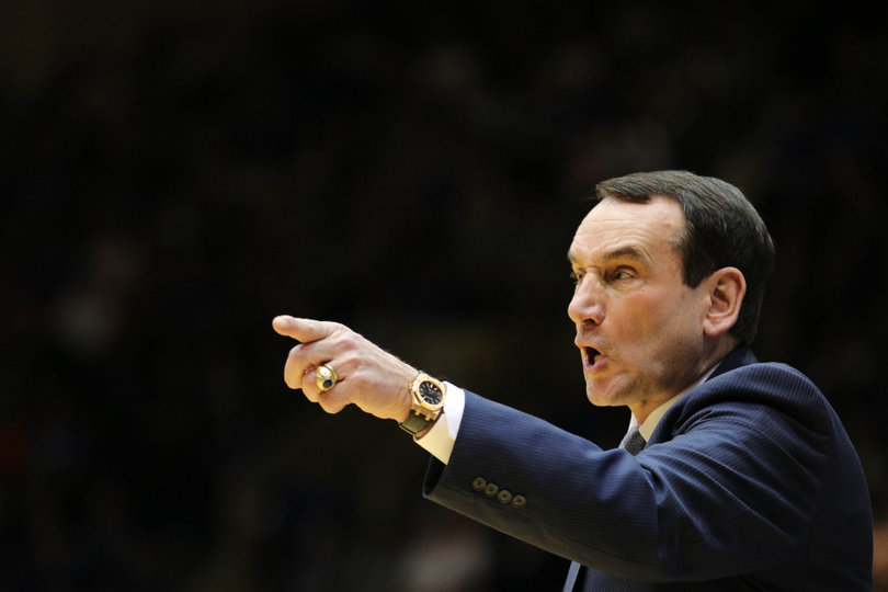 Mike Krzyzewski gives orders to his team during the first half. His Blue Devils owned a nine-point lead after 20 minutes.