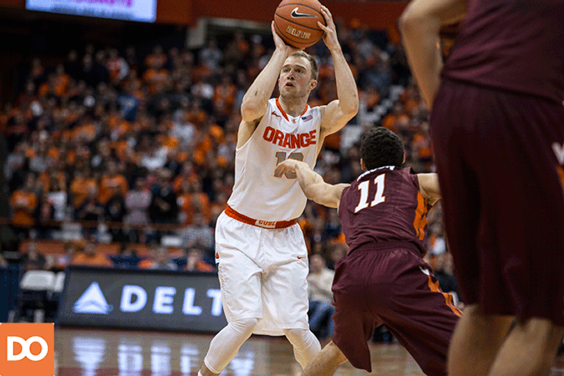 SU guard Trevor Cooney releases a jumpshot from the top of the key.