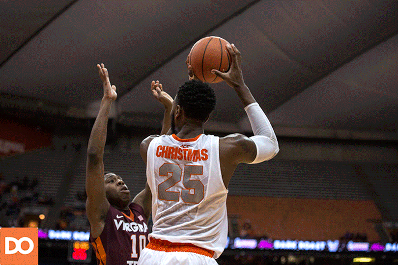 Christmas turns to the baseline and finishes from the left block to drop in two points.