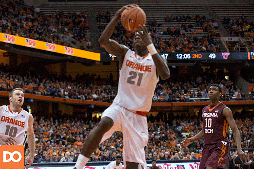 Syracuse forward Tyler Roberson throws down a one-hander in transition.