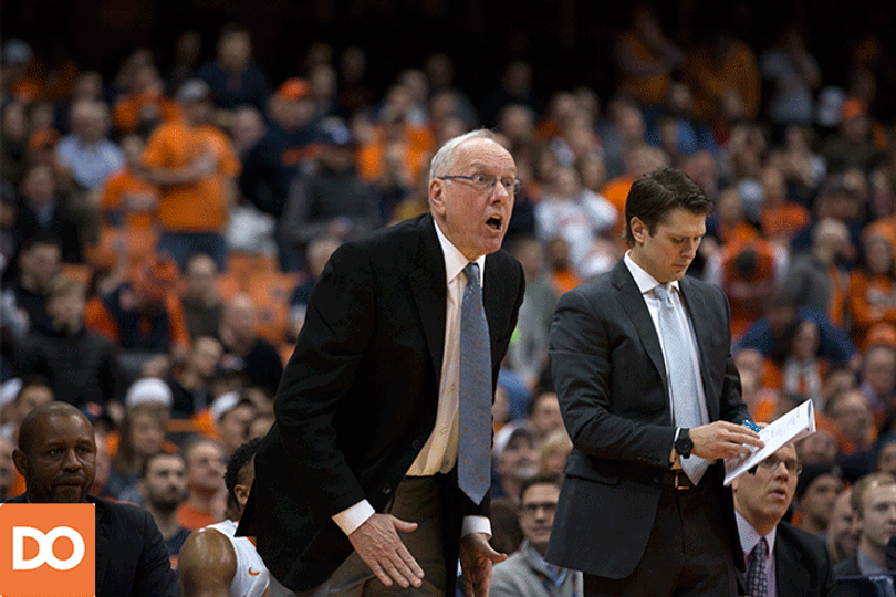 Boeheim angrily screams while backup center Chinonso Obokoh looks on.