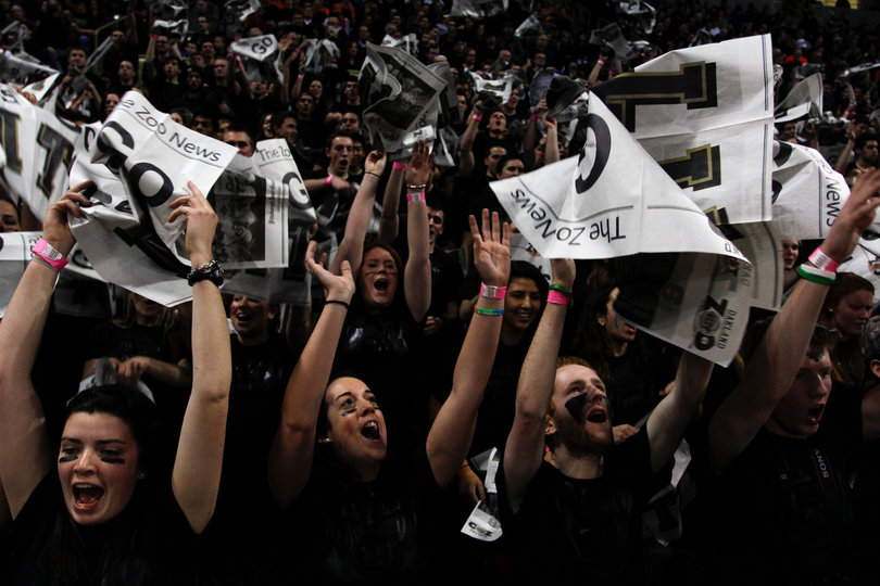 The "Oakland Zoo" enthusiastically supports its team as attention shifts to the Panthers before the game.