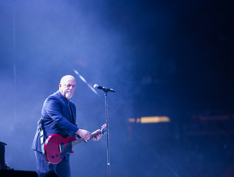 Singer-songwriter Billy Joel starts his concert on Friday night with the song "Matter of Trust."