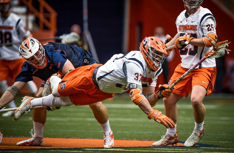 Williams dives with the ball in his stick. He left the game in the fourth quarter with an injury. 