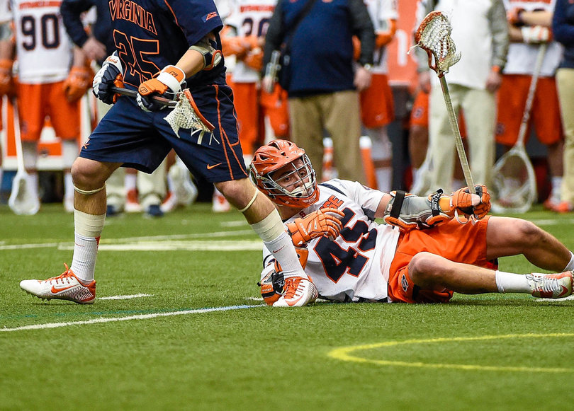 Randy Staats tries to get up after taking a spill on the turf.