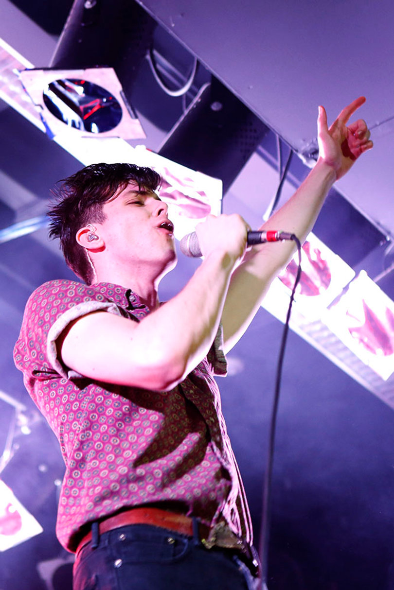 Alex Caplow, lead singer of Magic Man, repeatedly jumped around the stage to excite the lackluster crowd.