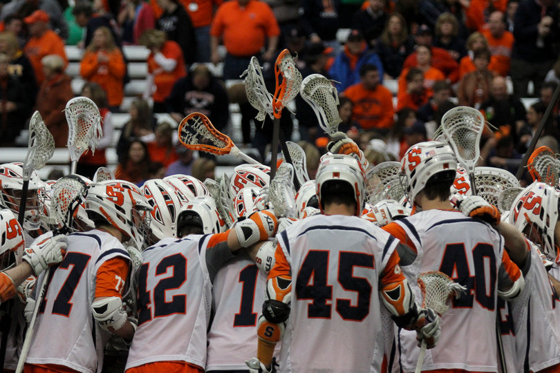 The Orange huddles during its game against the Blue Jays.