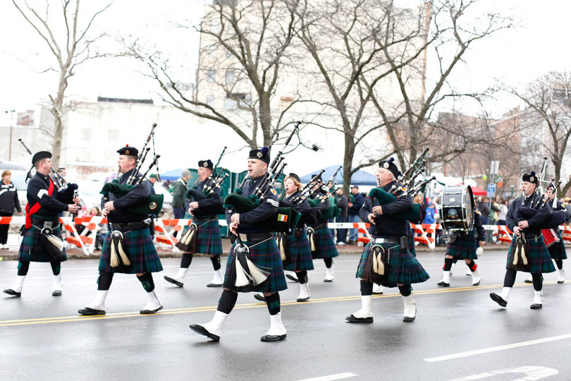 The Syracuse Kiltie Pipe Band plays in the Syracuse St. Patrick’s Day Parade on Saturday. The parade looped its way through downtown Syracuse starting at noon.