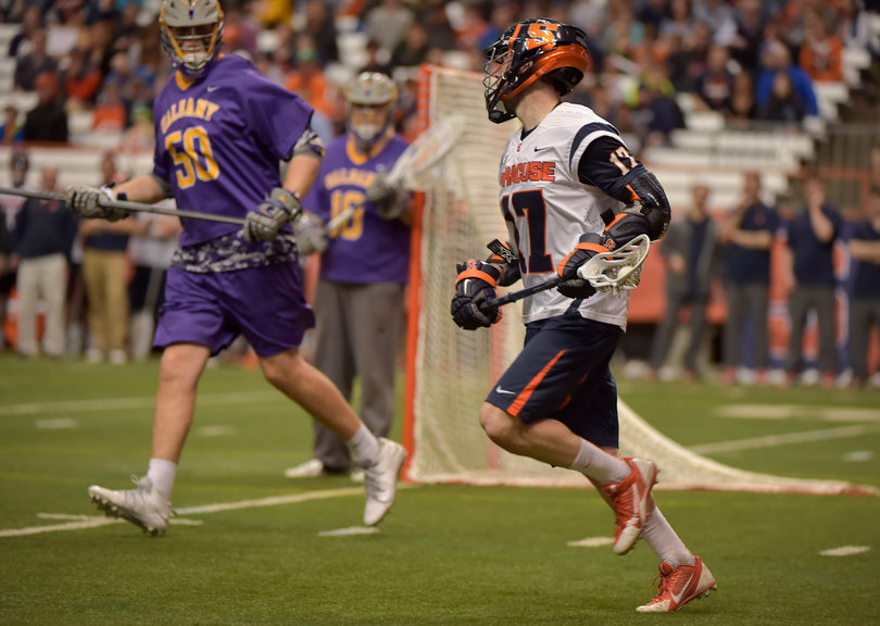 Donahue jogs in line with Albany's James Burdette