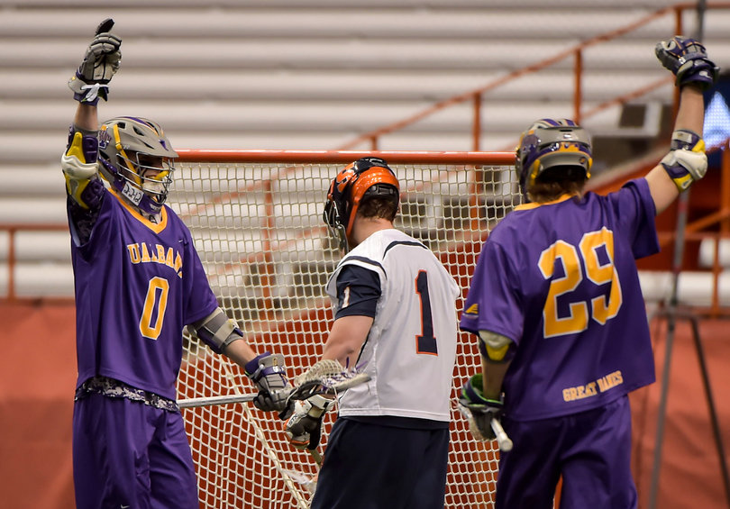 John Maloney and Matt Garziano celebrate a goal scored against Orange goalie Bobby Wardwell.