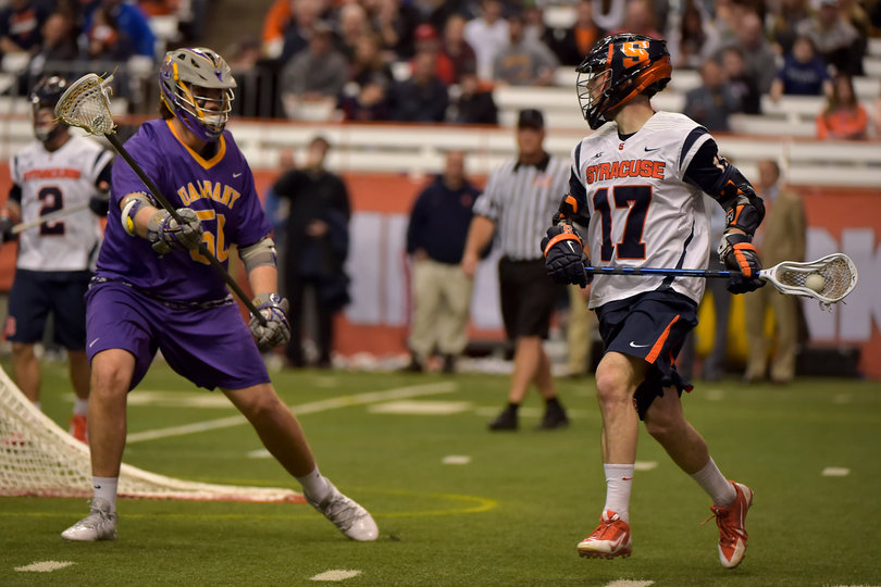 Syracuse attack Dylan Donahue patrols the area behind the Great Danes' crease.