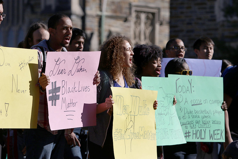 Duke University students hold signs reading: "Dear Duke, #BlackLivesMatter" in response to the incident, which occurred on April 1.