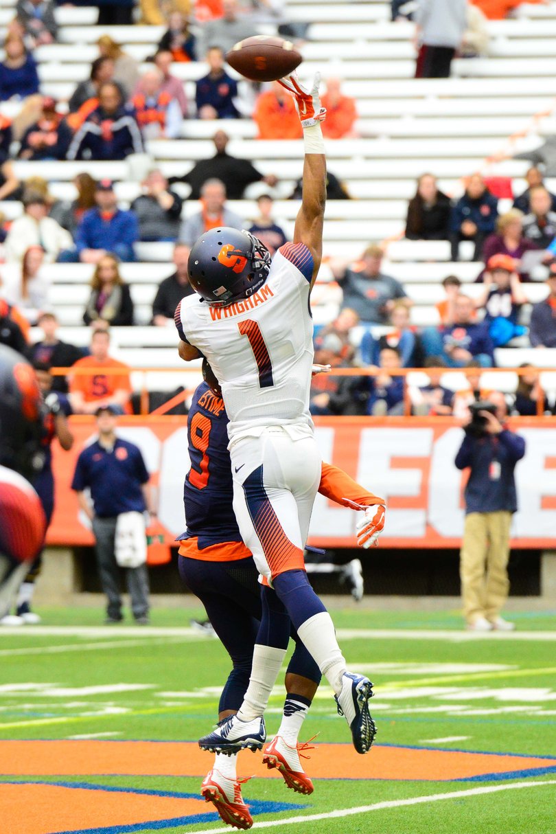 Rising senior and starting cornerback Julian Whigham makes a play on the ball while defending SU wide receiver Brisly Estime.