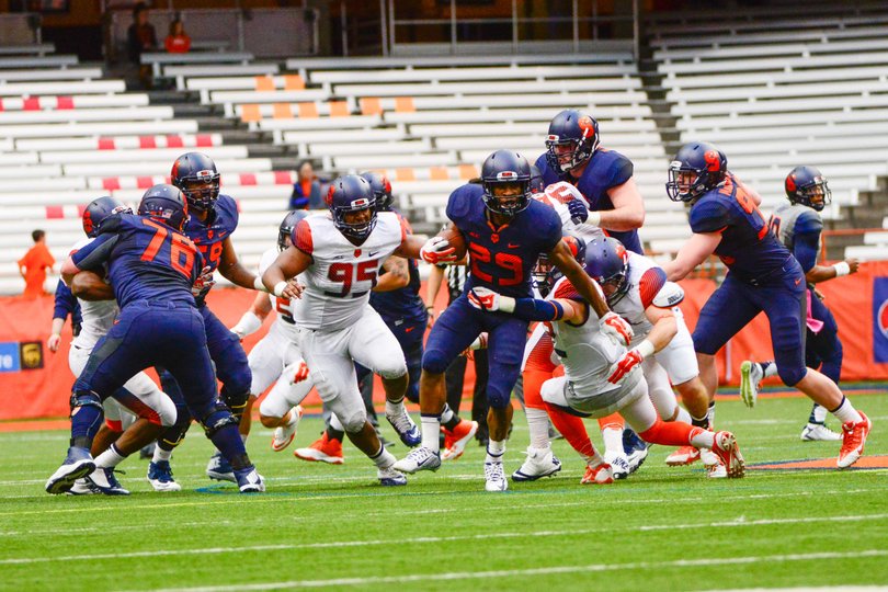 SU running back Devante McFarlane looks to get through an opening in the Orange's defense.