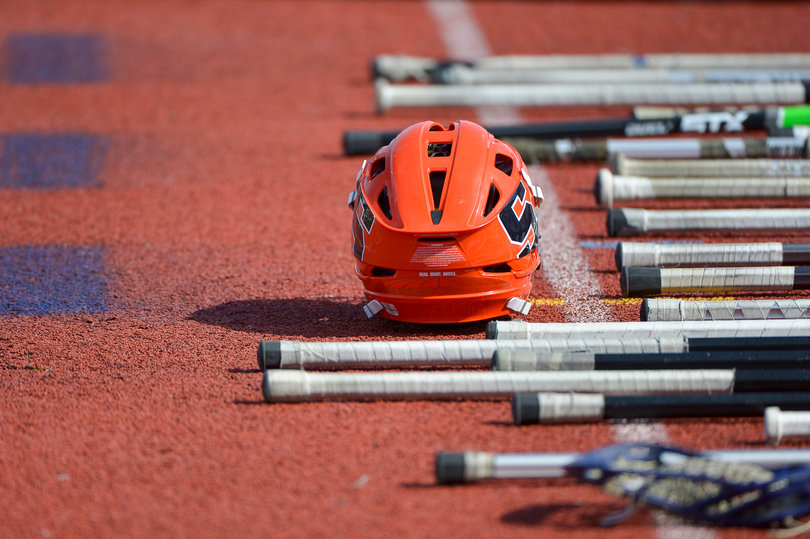 A Syracuse helmet sits among the sticks in Hamilton, New York on Saturday.  