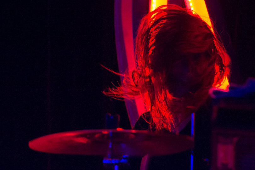Drummer Pat Kirch rocks out onstage with The Maine. At the end of the set, Kirch walked to the front of the stage and gave his drumsticks out to the fans.