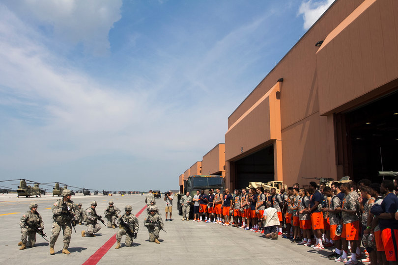Syracuse players look on at the airfield on Tuesday morning. 