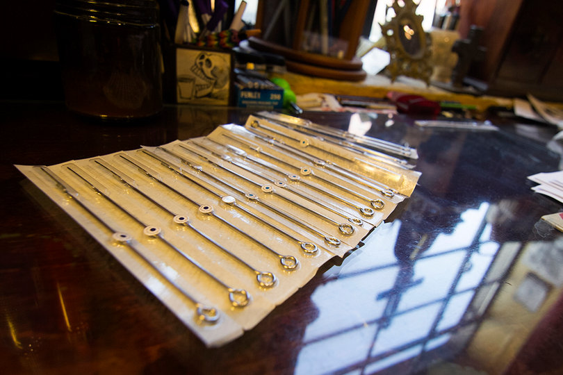 The bill, signed by Gov. Andrew Cuomo, requires all body piercing and tattoo studios to use prepackaged and sterile single-use needles and single-use ink.