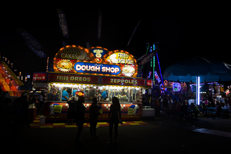 Patrons gather at one of the many food stands at the State Fair.