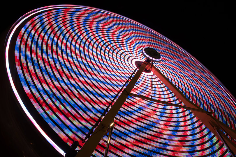 Red, white and blue lights glowed against the sky at the fairgrounds.